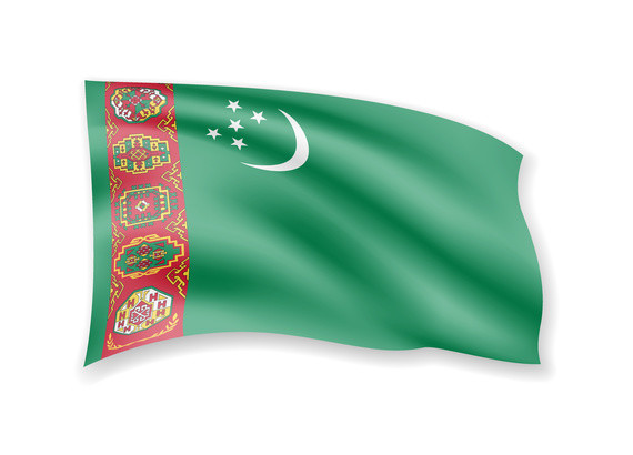 Eine grüne Flagge mit einem weißen Halbmond und fünf weißen Sternen, sowie einem traditionellen roten Ornament an der linken Seite.