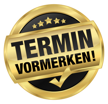 Ein goldener, runder Button mit dem Text 